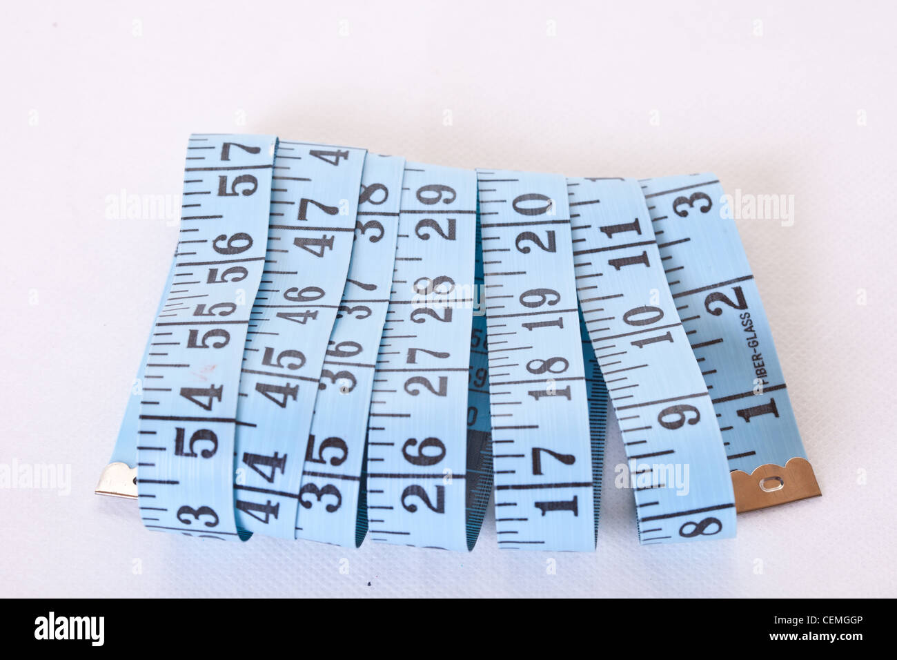 60 cloth measure,tape measure,inches,centimeters,tailors tape,seamstress  tape,tailor,seamstress,measuring tape Stock Photo - Alamy