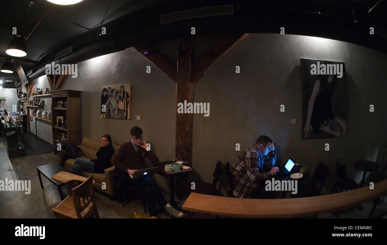 Modca Customers at Modca, an internet cafe in Brooklyn, New York Stock Photo ...