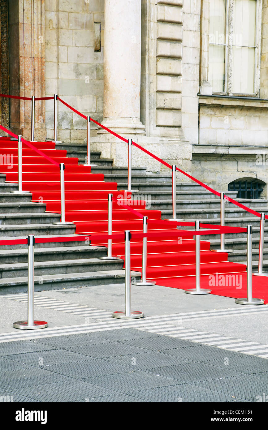 Beautiful shot of red carpet stairs awaiting vip, celebrities or government officials for a celebration or special event. Stock Photo