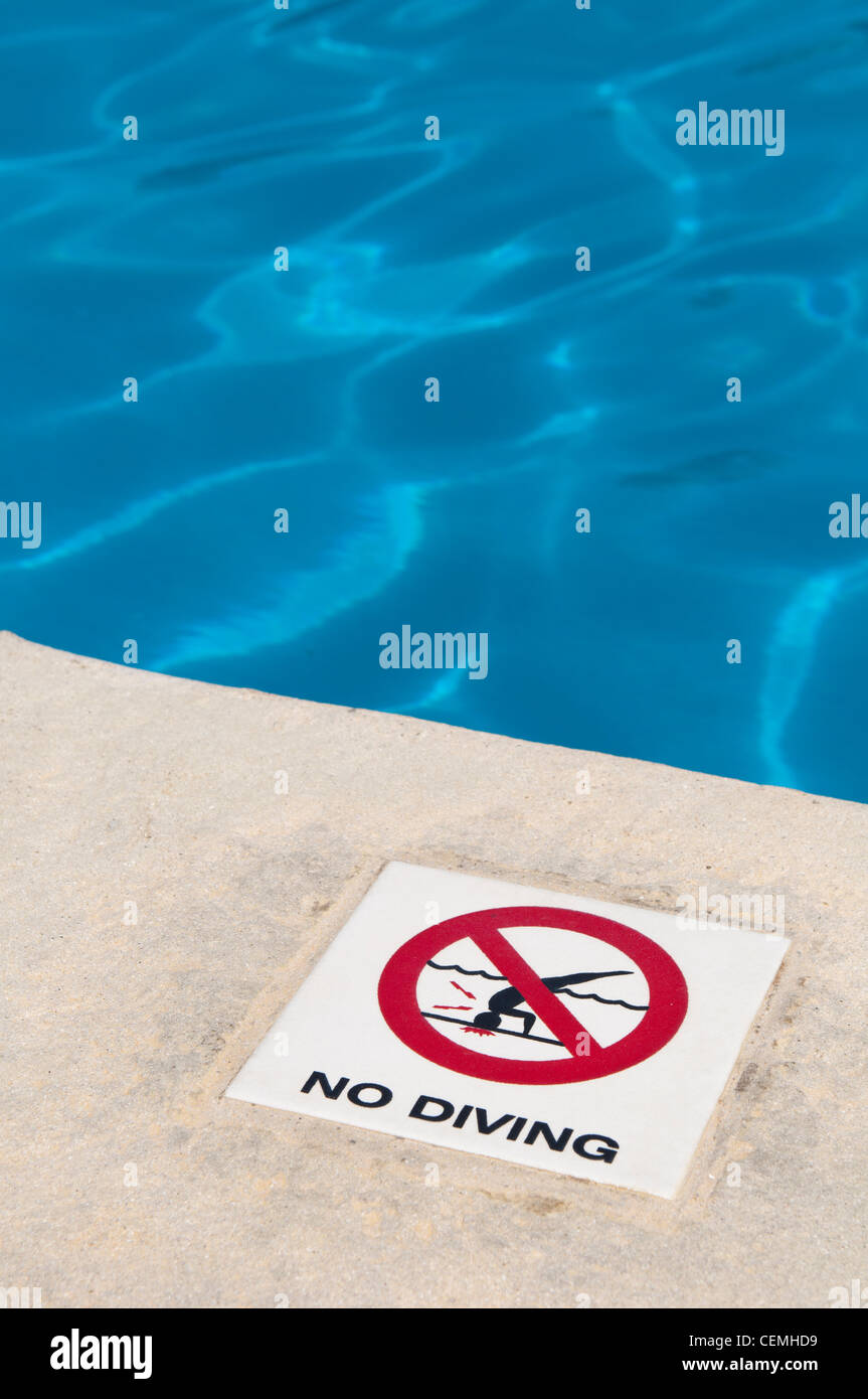 no diving sign at the poolside Stock Photo - Alamy