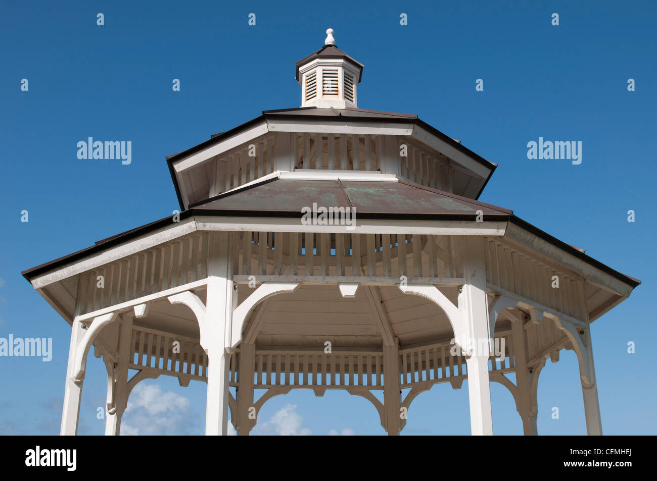 white gazebo against blue sky background Stock Photo - Alamy