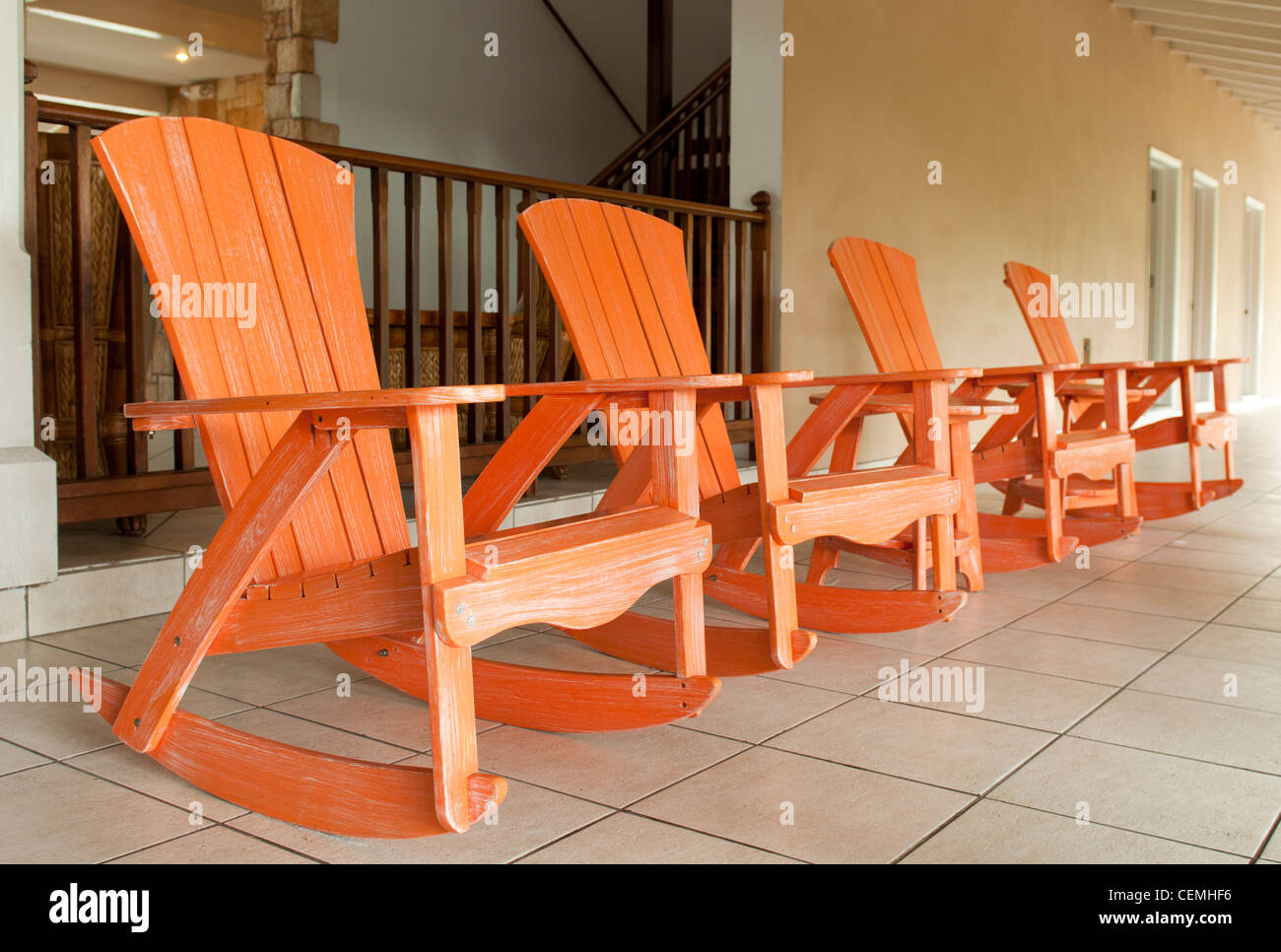 Wooden rocking chairs hi-res stock photography and images - Alamy