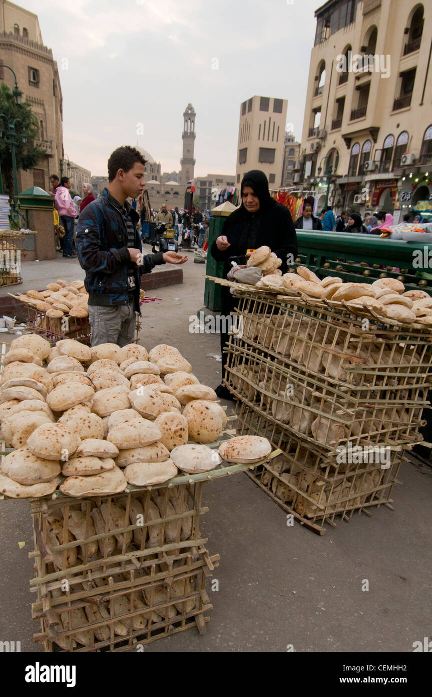 Al Hussein square at the entrance of Khan El Khalili market , bread vendor Stock Photo
