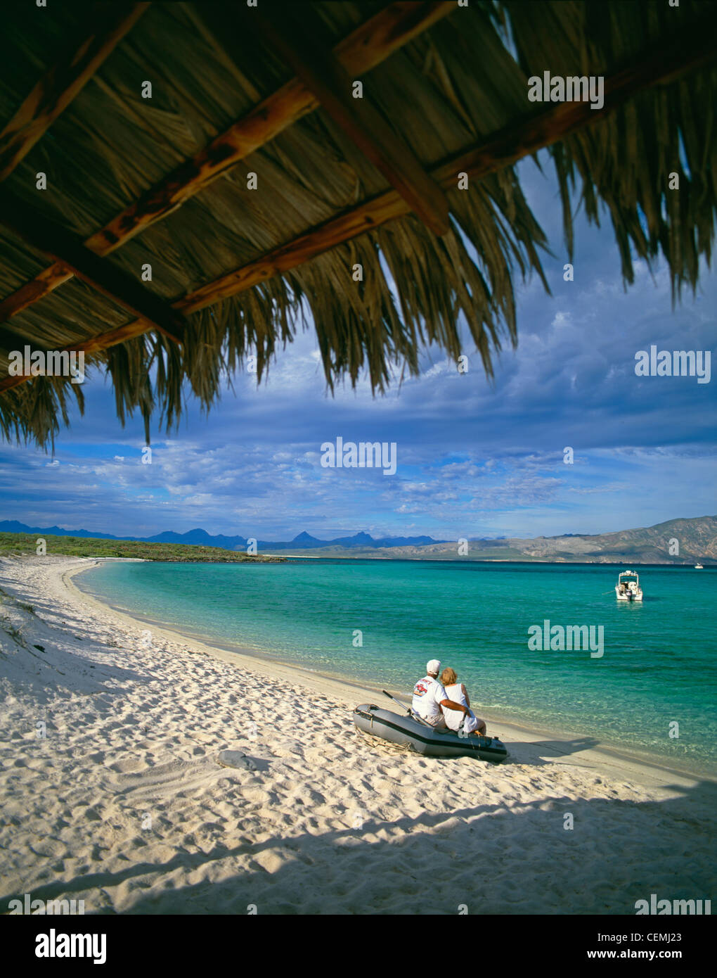 A couple enjoys the peaceful beach on Isla Coronado, near Loreto, Baja California Sur, Mexico Stock Photo