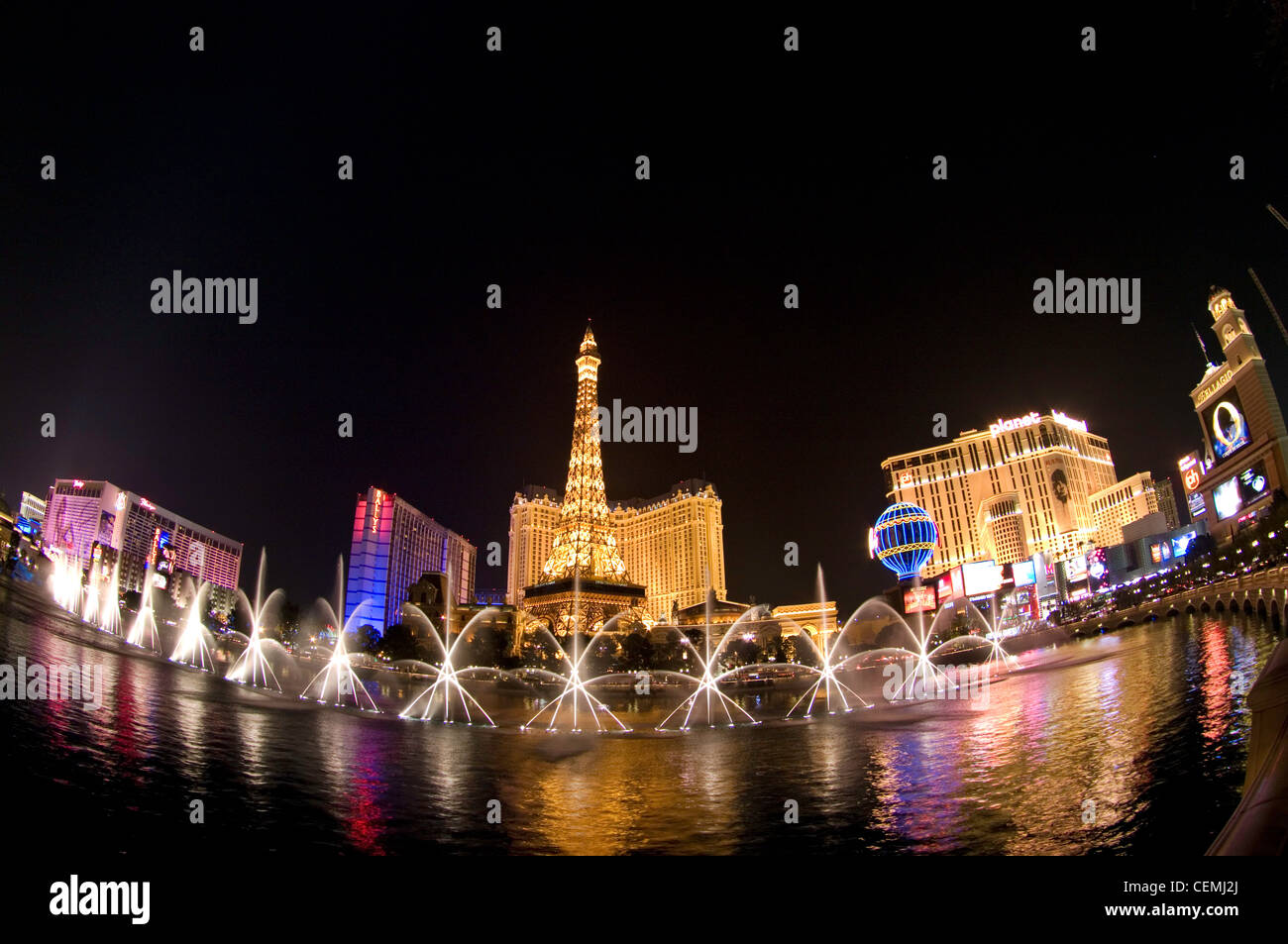 The Fountains of Bellagio play before the Eiffel Tower of the Paris Casino, Las Vegas, Nevada Stock Photo