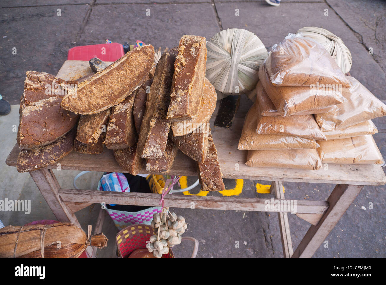 Molded brown sugar, panela, on display for sale at the market in Pujili, Ecuador. Stock Photo