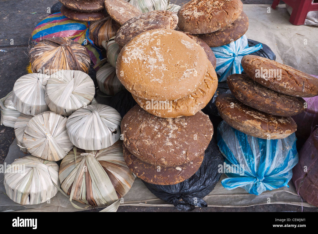 Molded brown sugar, panela, on display for sale at the market in Pujili, Ecuador. Stock Photo