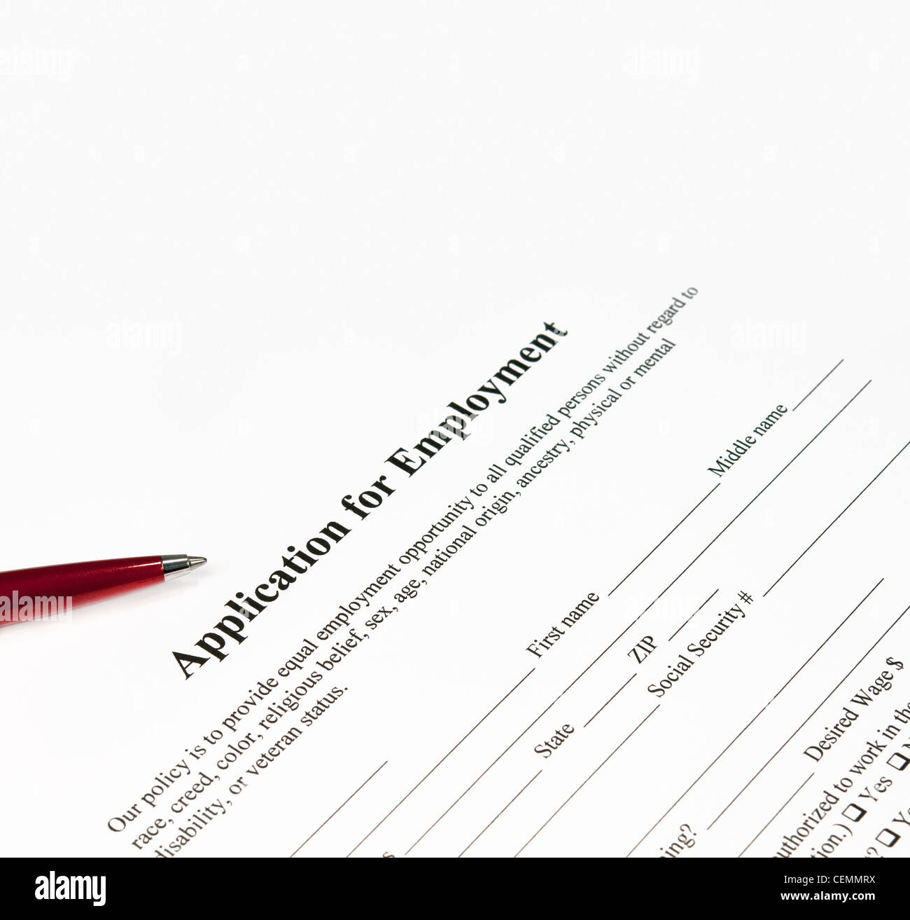 Close up image of an application for employment ready to be filled ...