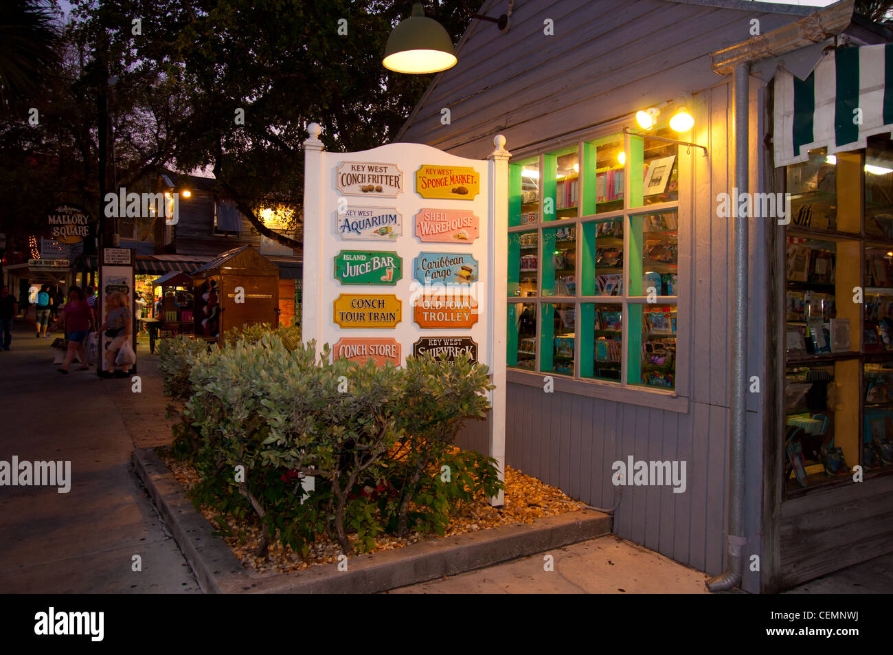 Old shops and signs of Key West in the evening Stock Photo Alamy