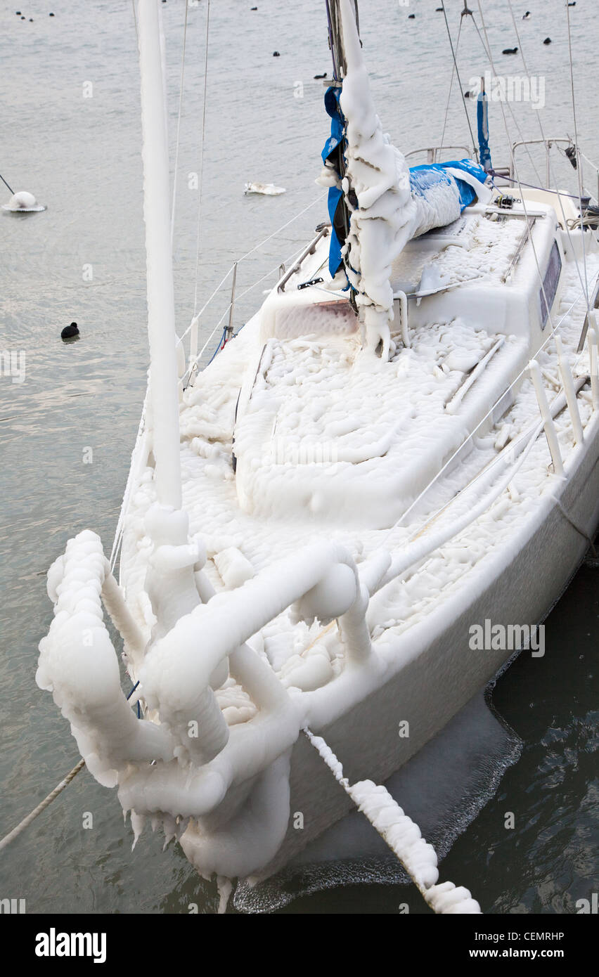 A Boat Covered in Ice Stock Photo