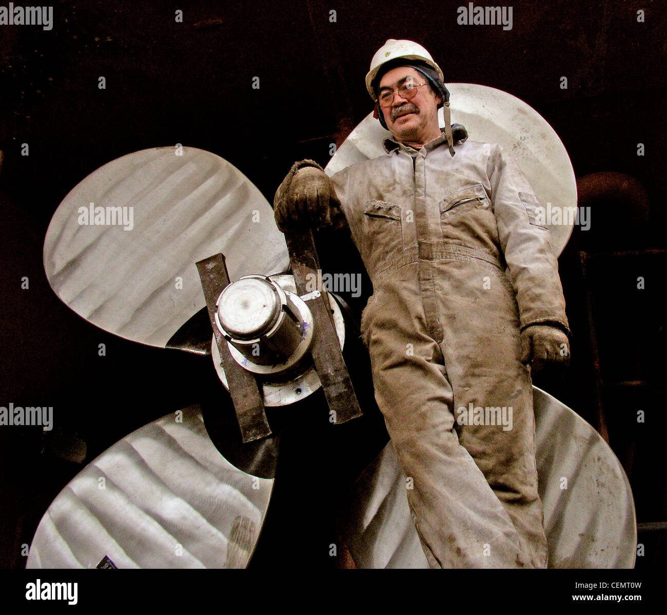 Tug boat repair man Stock Photo Alamy