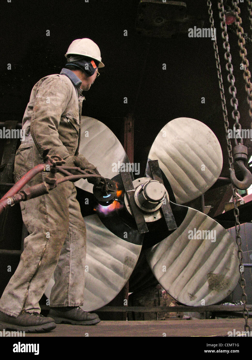 Tug boat repair man Stock Photo Alamy