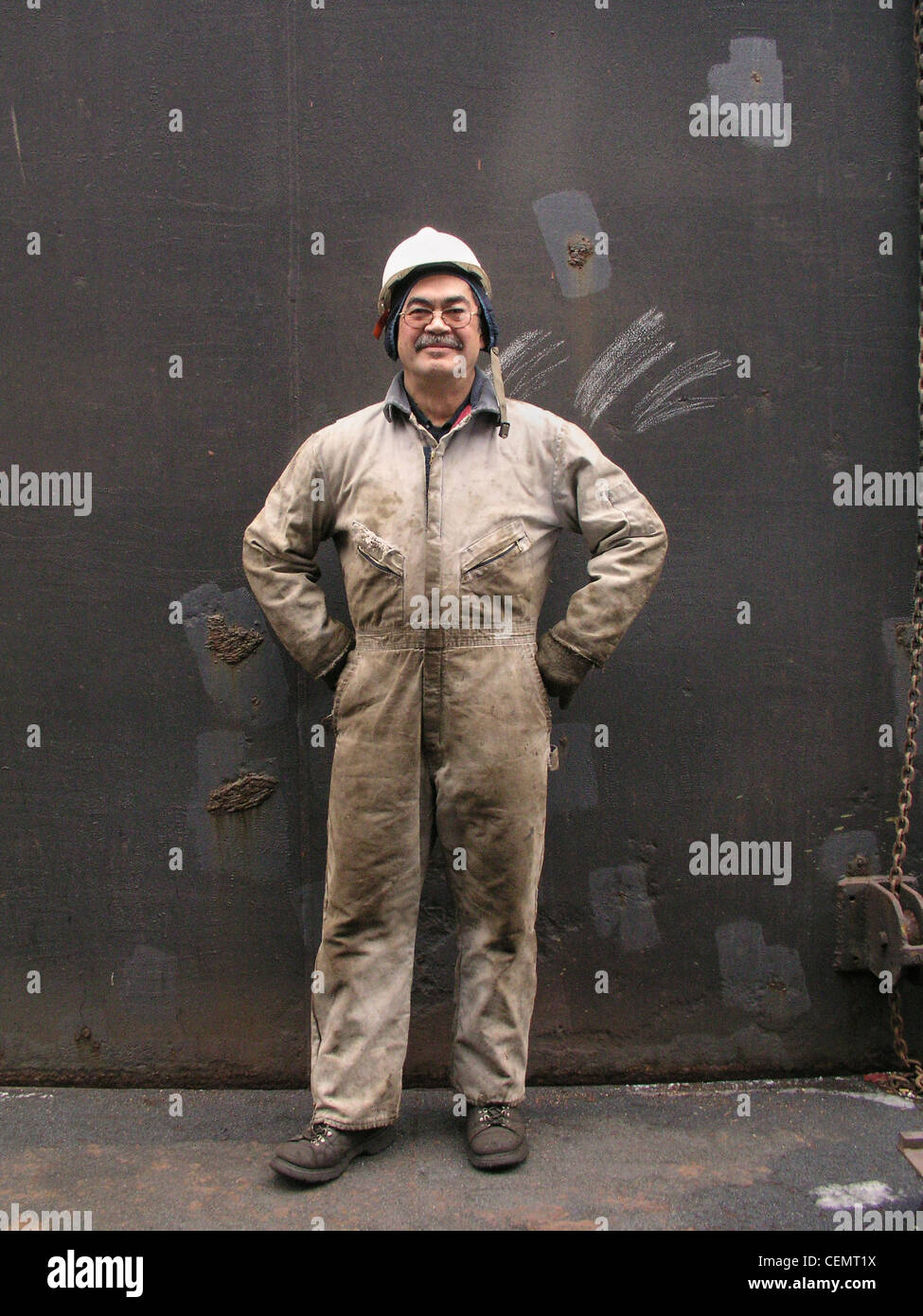 Tug boat repair man Stock Photo Alamy