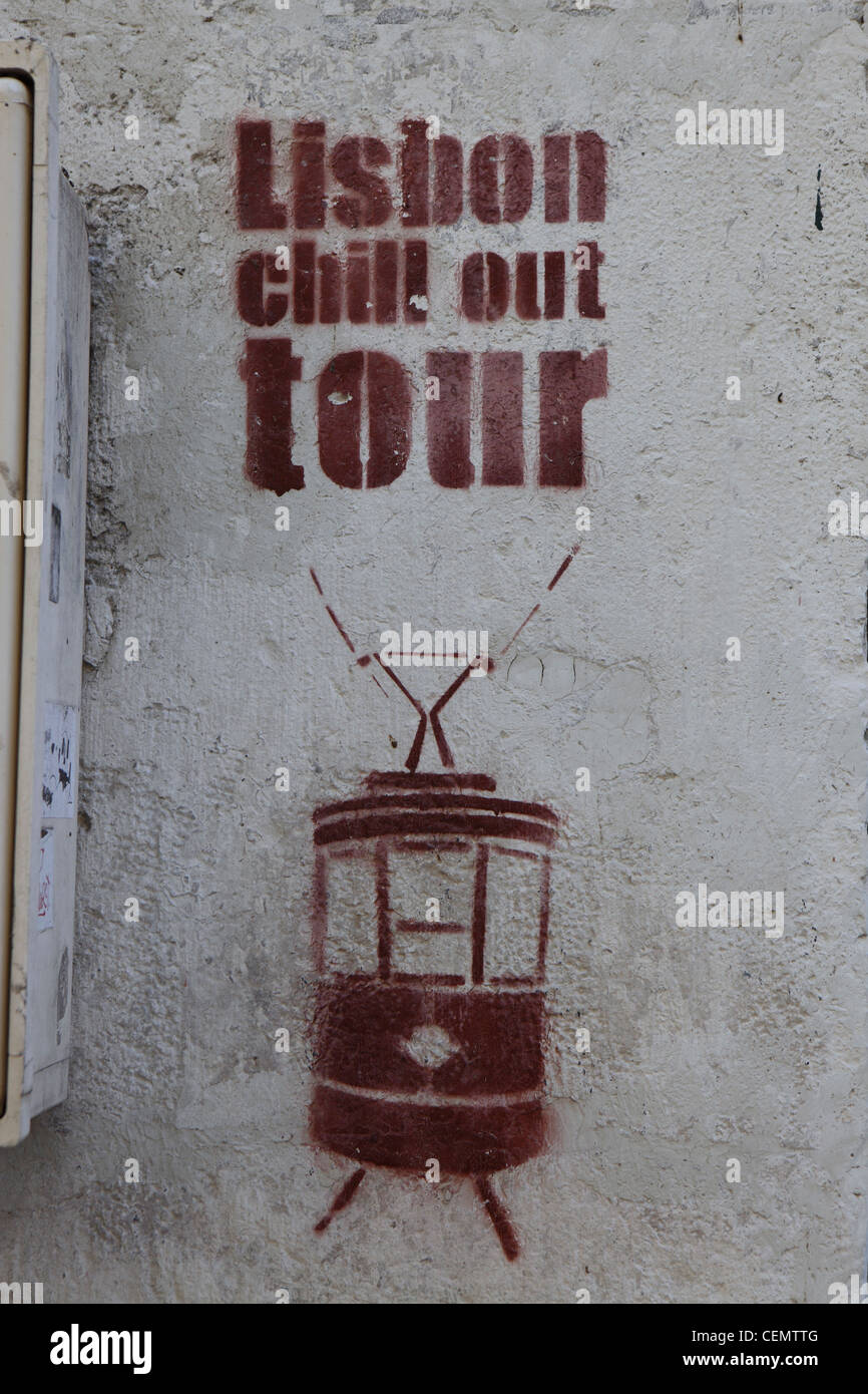 'Lisbon Chill Out Tour', stencil red spray paint graffiti image of tram, wall Lisbon, Portugal, Europe Stock Photo