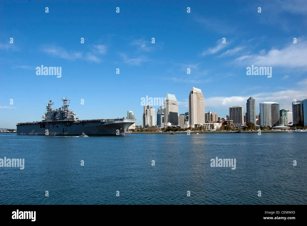 The amphibious assault ship USS Peleliu (LHD 5) transits through the San Diego Bay. Peleliu is returning from a scheduled underway in preparation for its upcoming 2012 deployment. Stock Photo