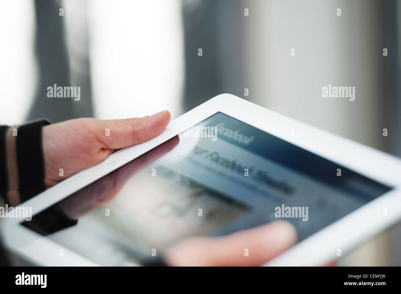 This is an image of an iPad 2 screen showing the facebook login page Stock Photo