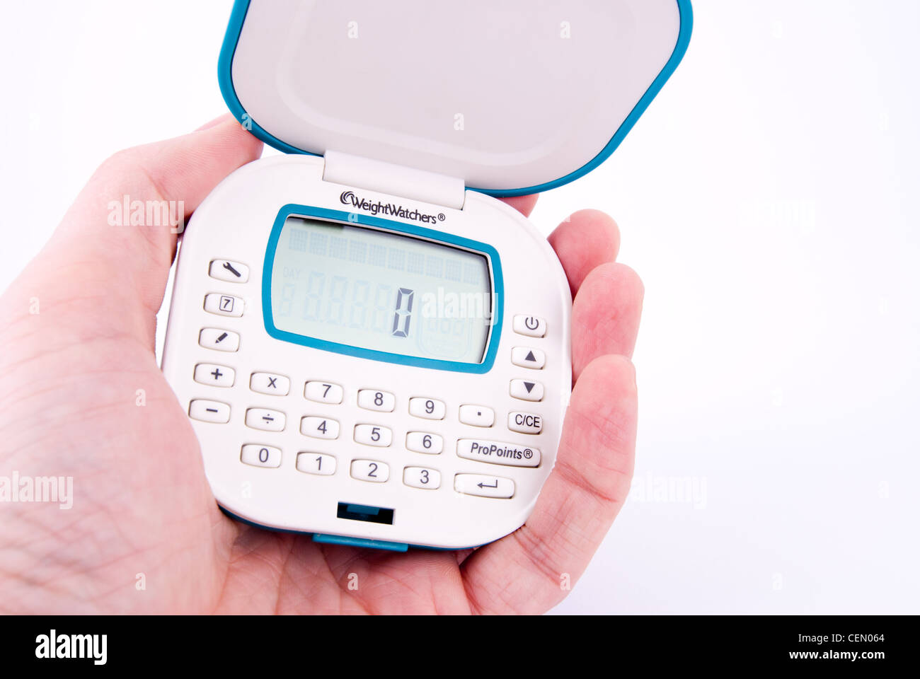 Man's Hand Holding a Weightwatchers Pro Points Calculator Stock Photo -  Alamy