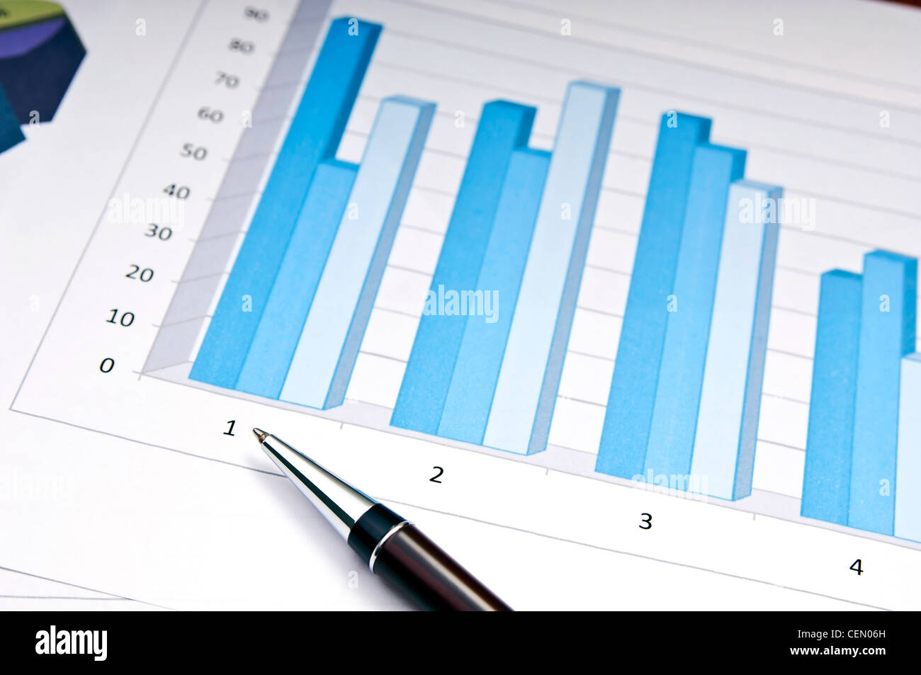 Bar charts and pen as accounting or business concept Stock Photo Alamy