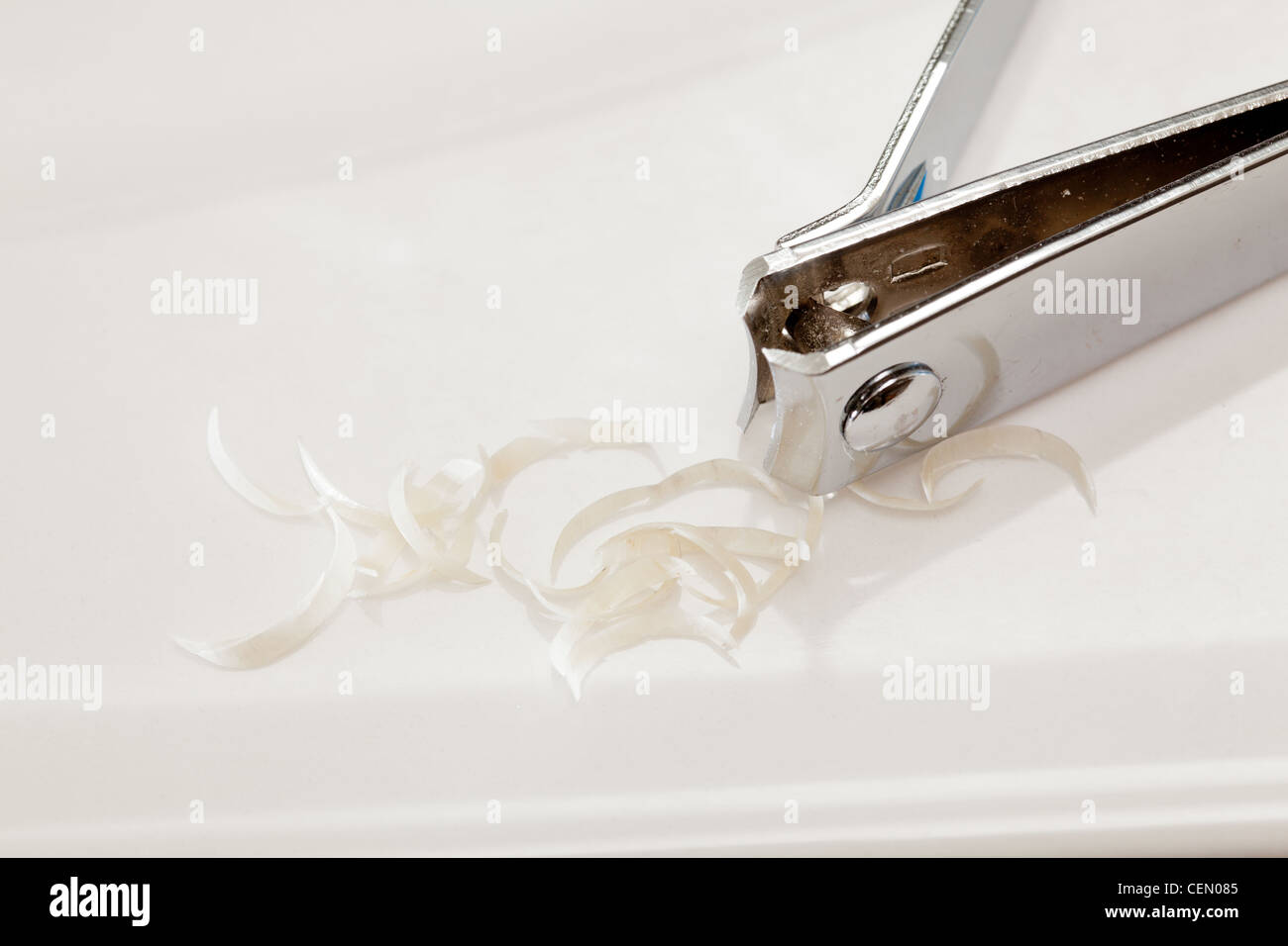 Finger nail clippings on bathroom sink Stock Photo