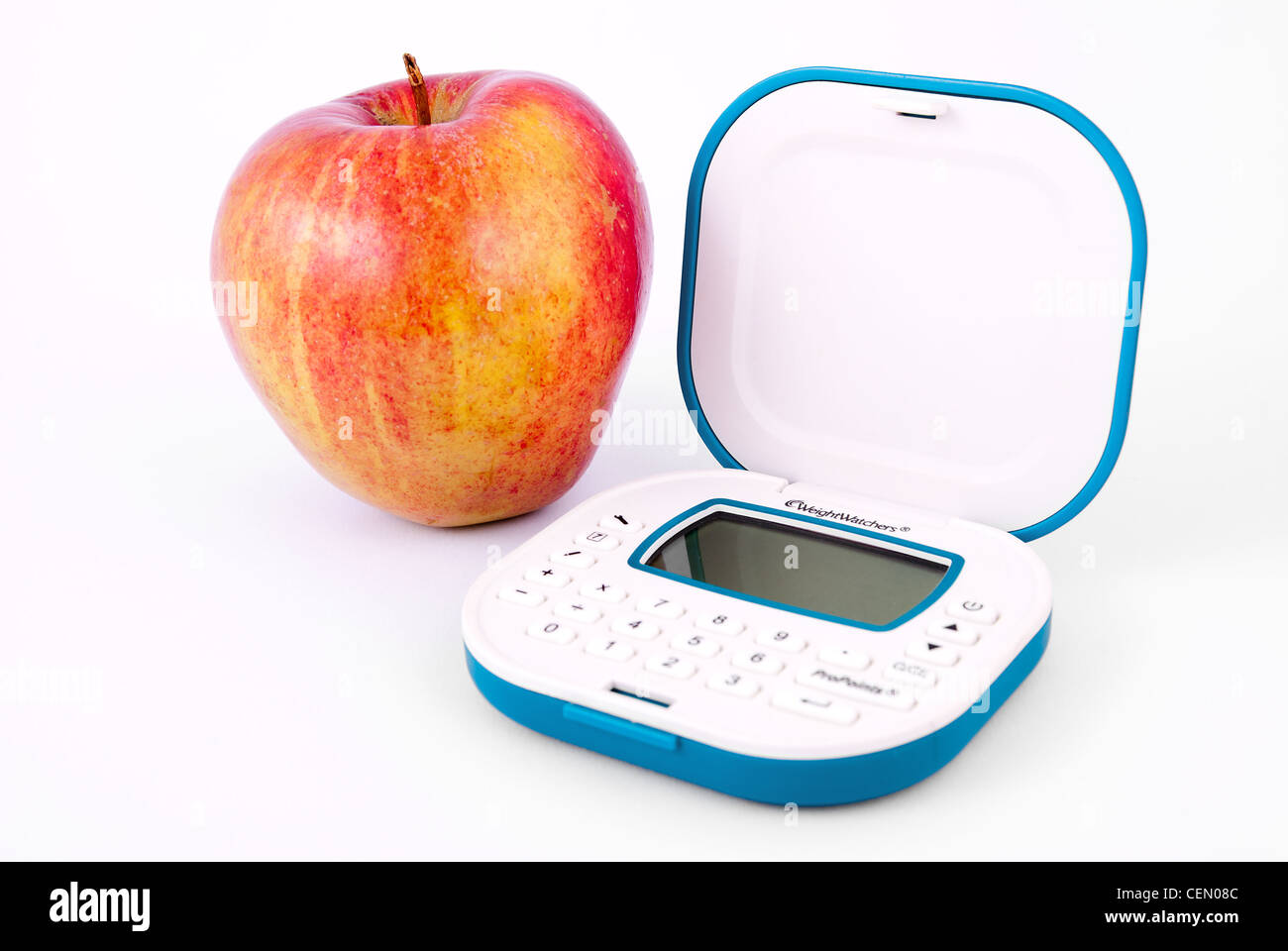 Weight watchers Pro Points calculator with apple Stock Photo - Alamy