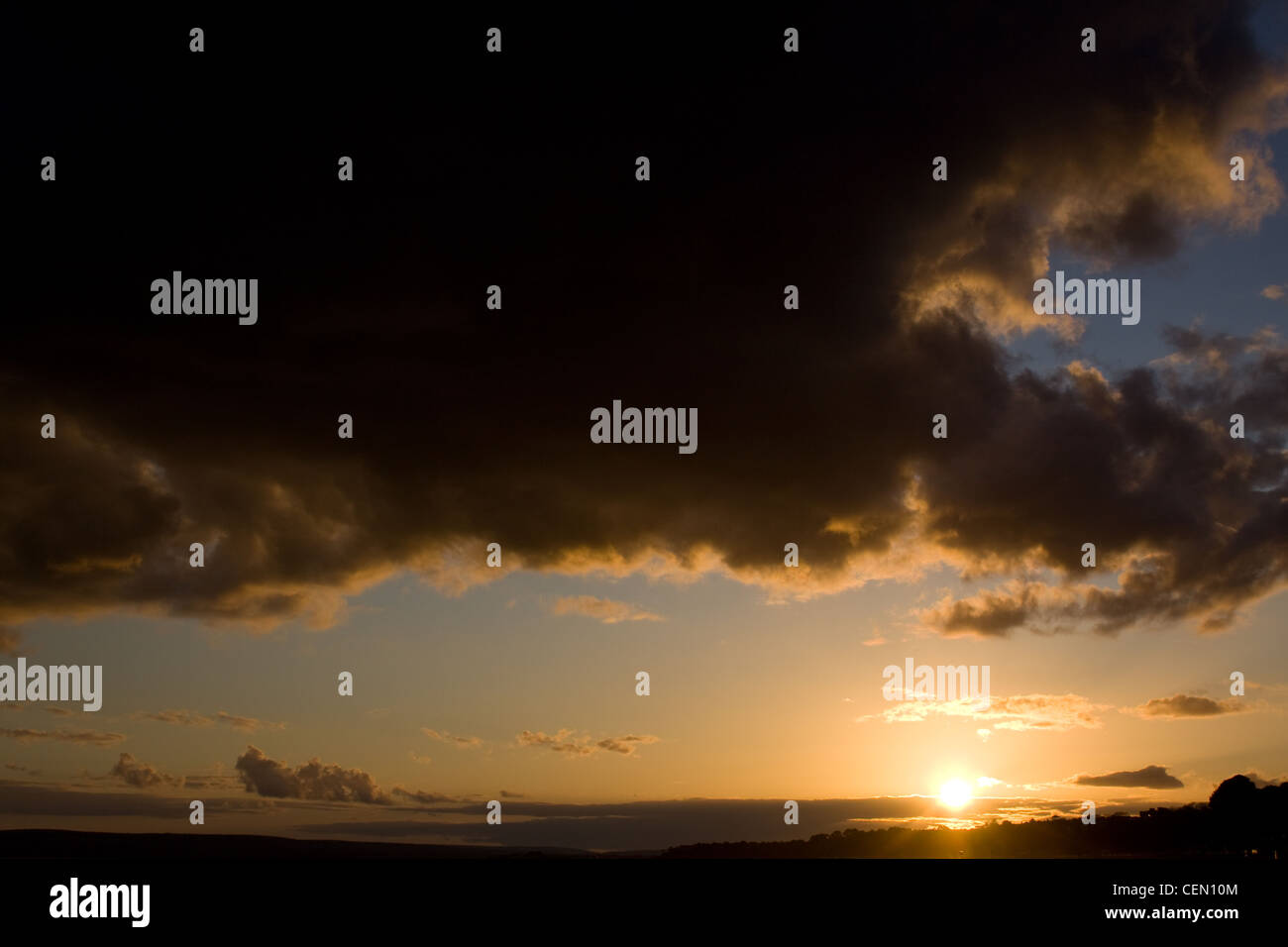 Sunset at the sea Stock Photo - Alamy