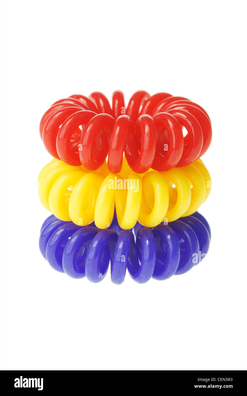 Colorful Spiral Elastic Hair Ties on White Background Stock Photo