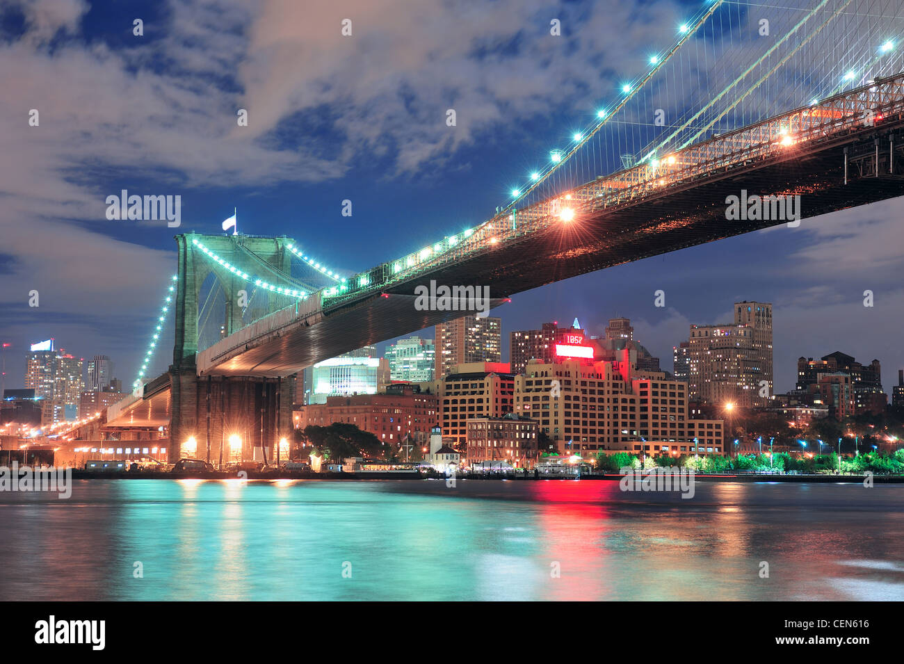 Brooklyn Bridge over East River at night in New York City Manhattan ...