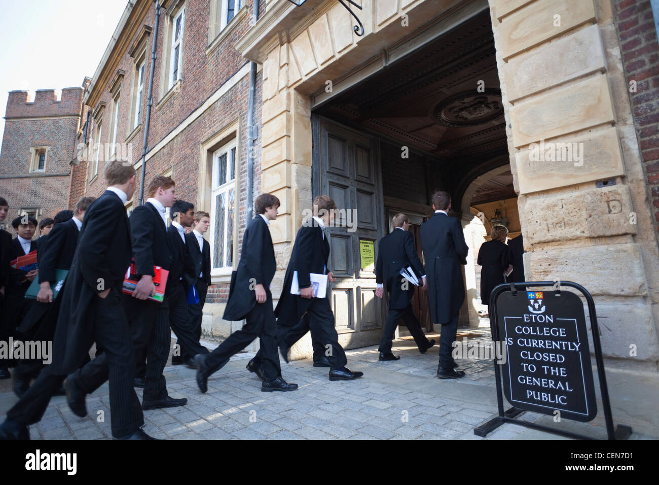 England, Berkshire, Eton, Students entering Eton College Stock Photo