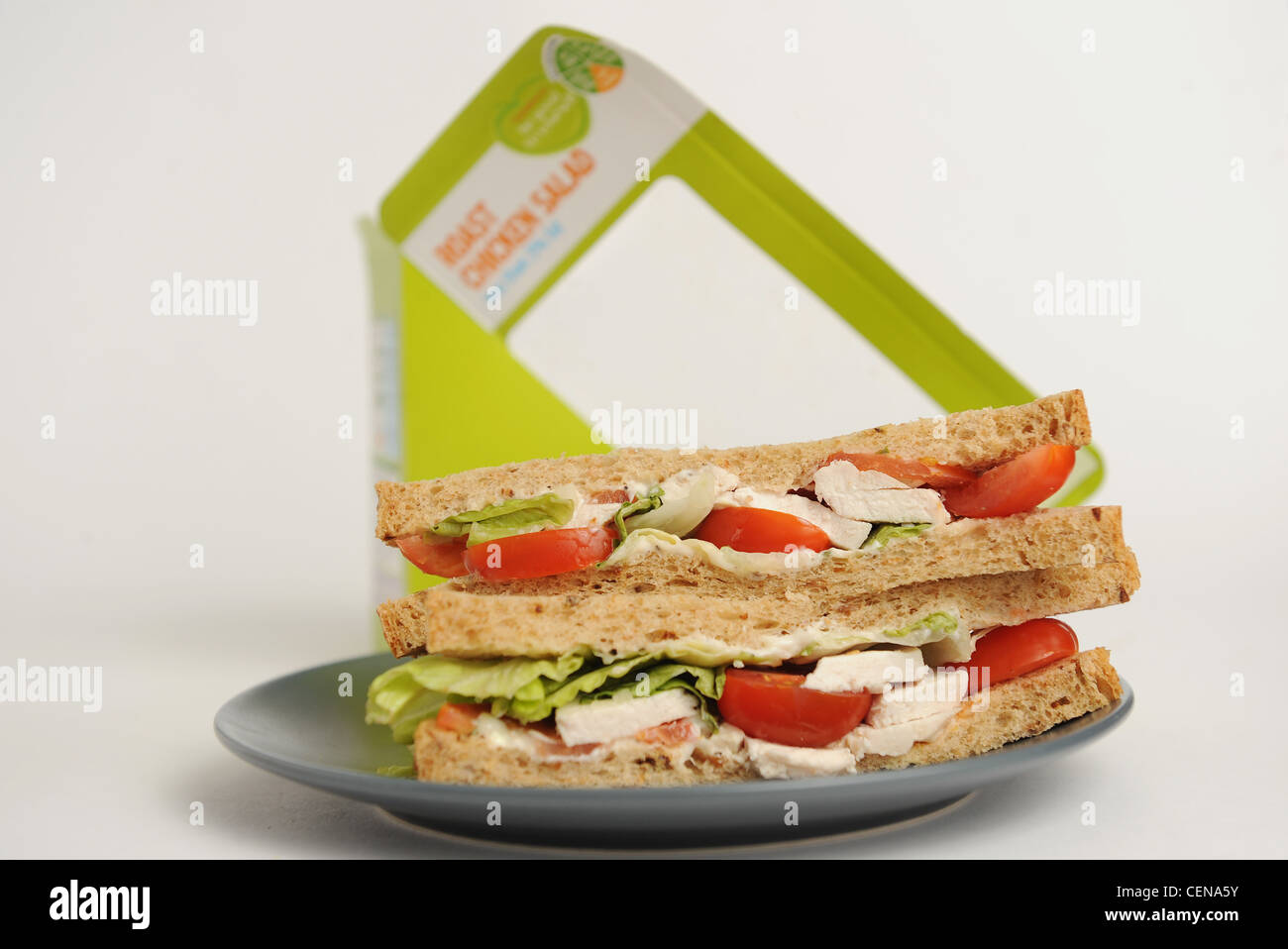 Prepacked Roast chicken salad sandwich on grey plate Stock Photo Alamy