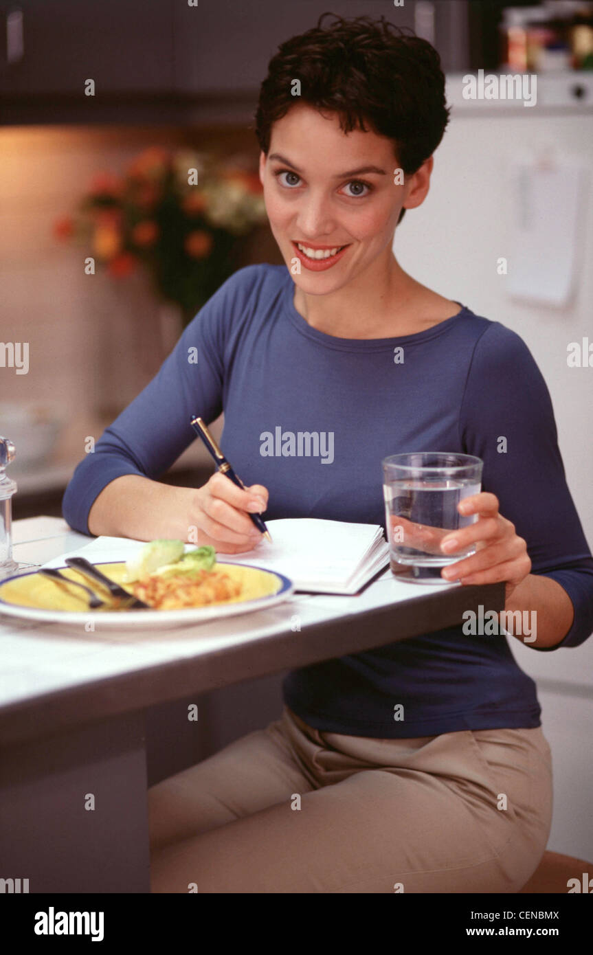 Female wearing beige top hi-res stock photography and images - Alamy
