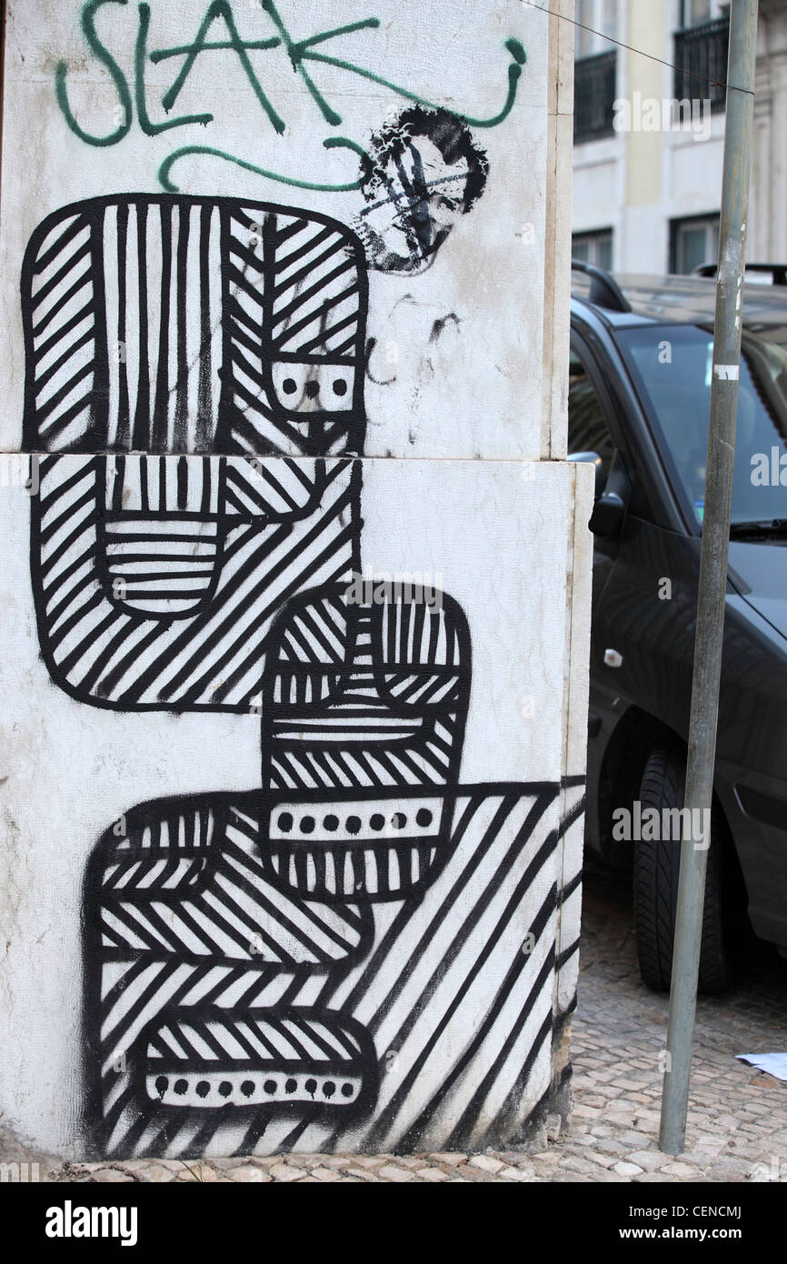 Black and white abstract graffiti, street art, on wall in central Lisbon, Portugal. Stock Photo