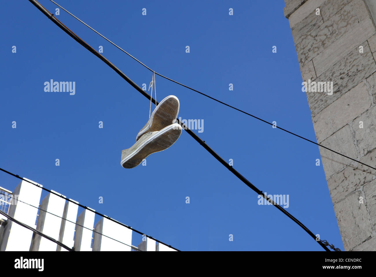 Shoefiti, youth culture rite of passage, central Lisbon, Portugal. Stock Photo