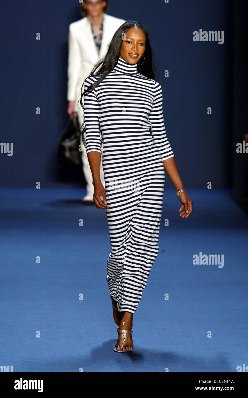 Tommy Hilfiger New York Ready To Wear Spring Summer Model Naomi Campbell  long black hair wearing long black and white striped Stock Photo - Alamy