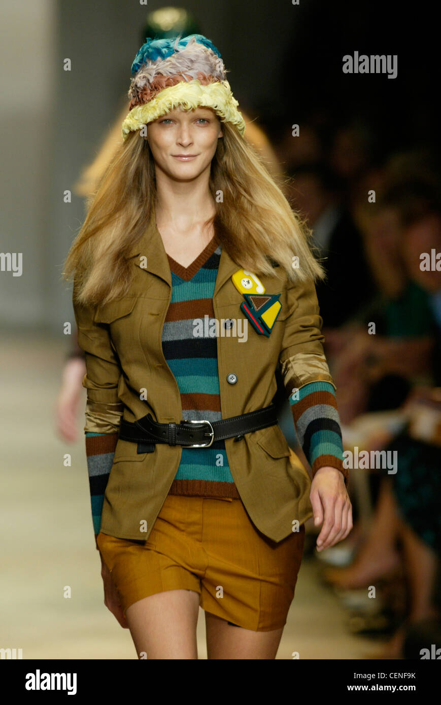 Backstage Milan Spring Summer Prada Model Carmen Kass long stright blonde  hair brown roots, pale pinkmatt lipstick, looking to Stock Photo - Alamy