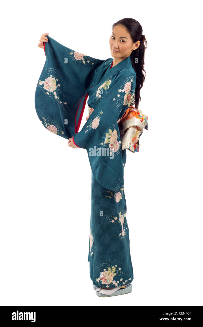 Full length of Japanese woman in traditional clothes of kimono isolated over white background Stock Photo