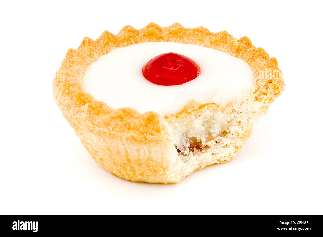 Bakewell tart with a missing bite over white Stock Photo