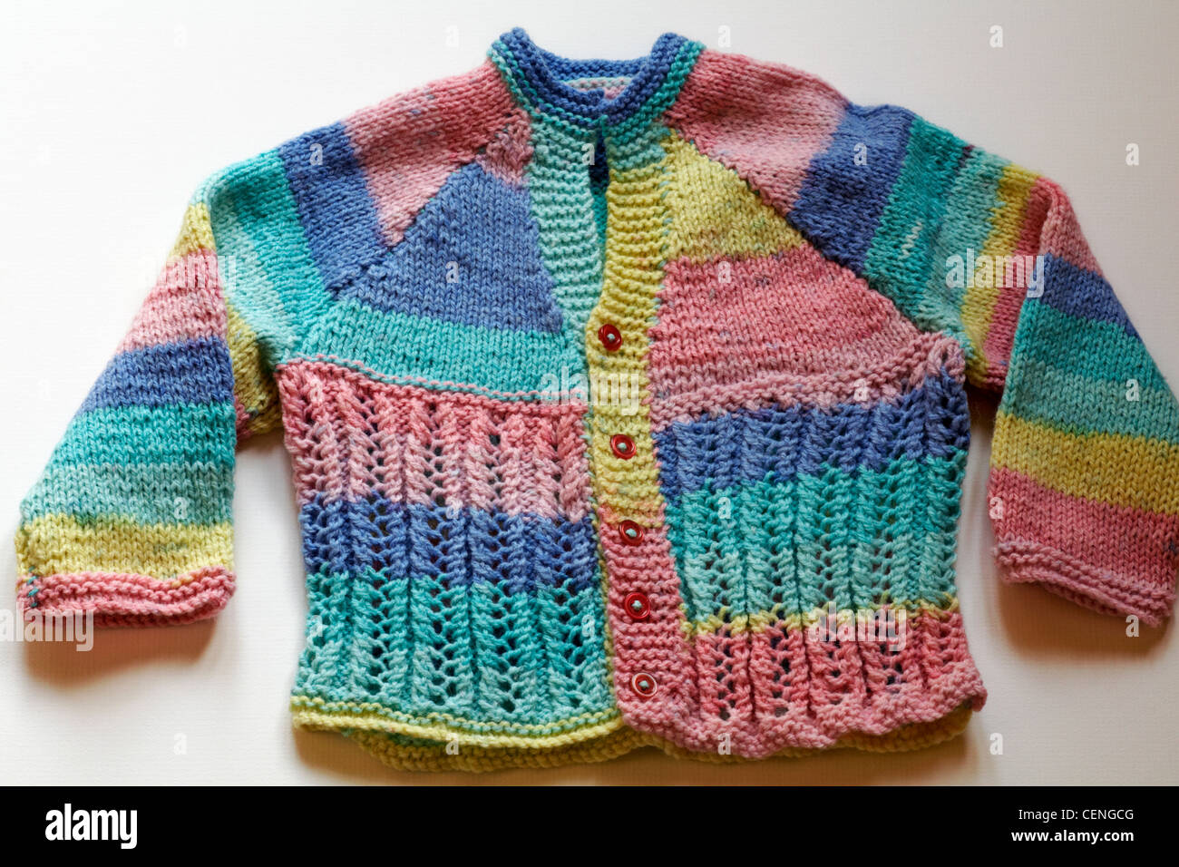 white knitted baby cardigan