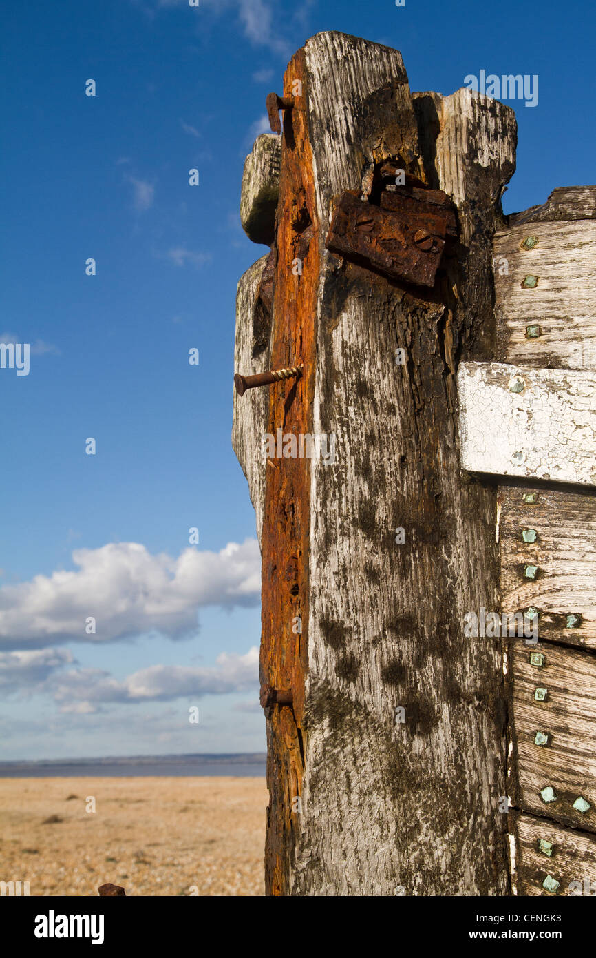 old and abandoned fishing boat on the beach in Dungeness in Kent Stock ...
