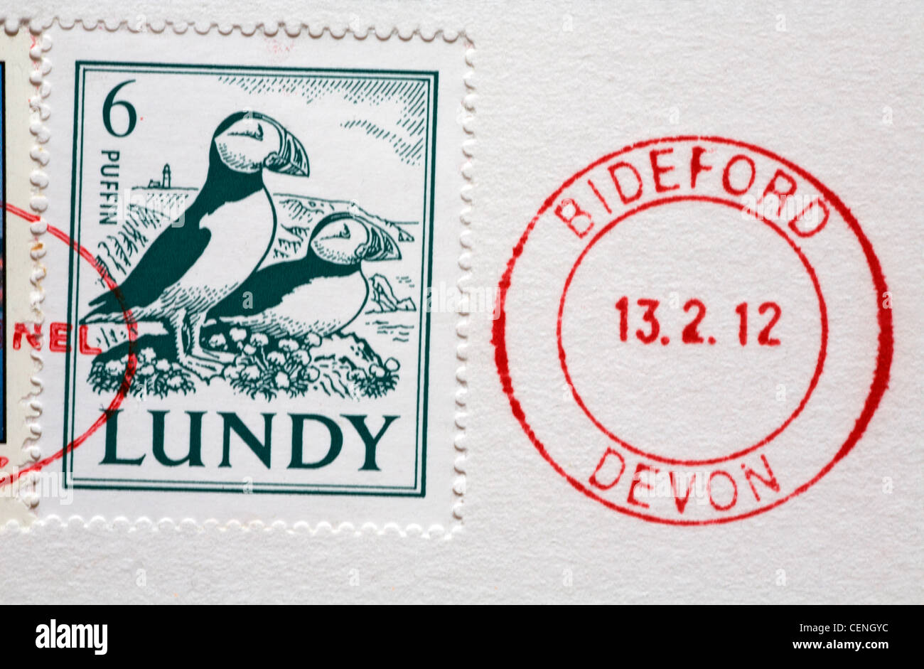 Lundy puffin stamp on postcard with Bideford Devon mailing stamp Stock Photo