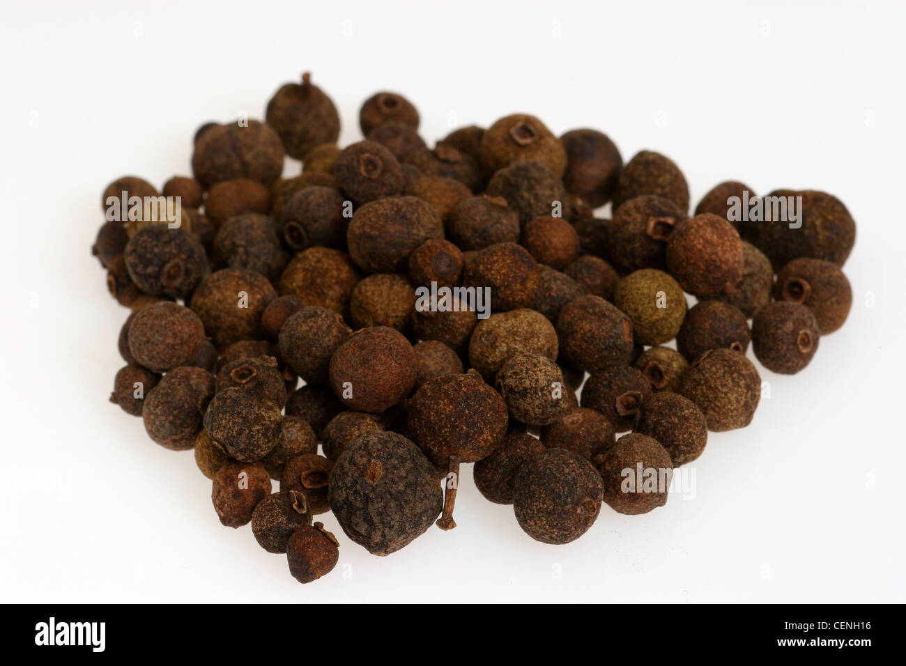 A small pile of dried allspice berries Stock Photo Alamy