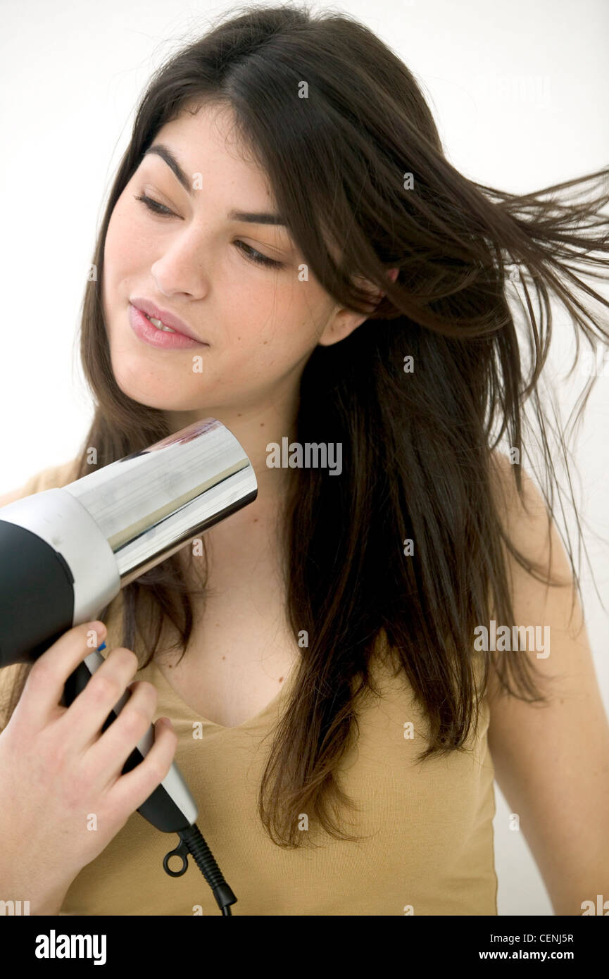 Female wearing beige top hi-res stock photography and images - Alamy