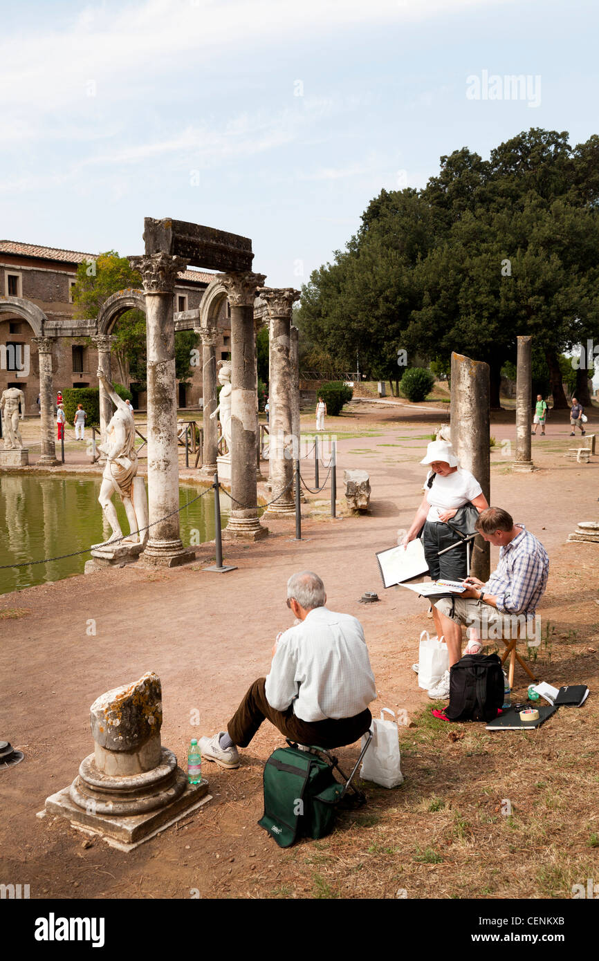 An art gtoup paintint the colonade at the end of the Canopus at Hadrian's Villa, Tivoli, Italy Stock Photo