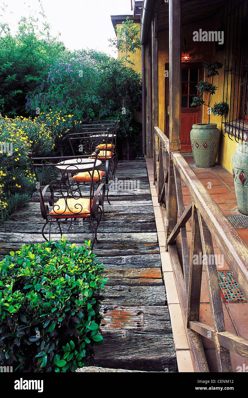 City Garden Tiled Verandah Small Trees Growing In Large Green