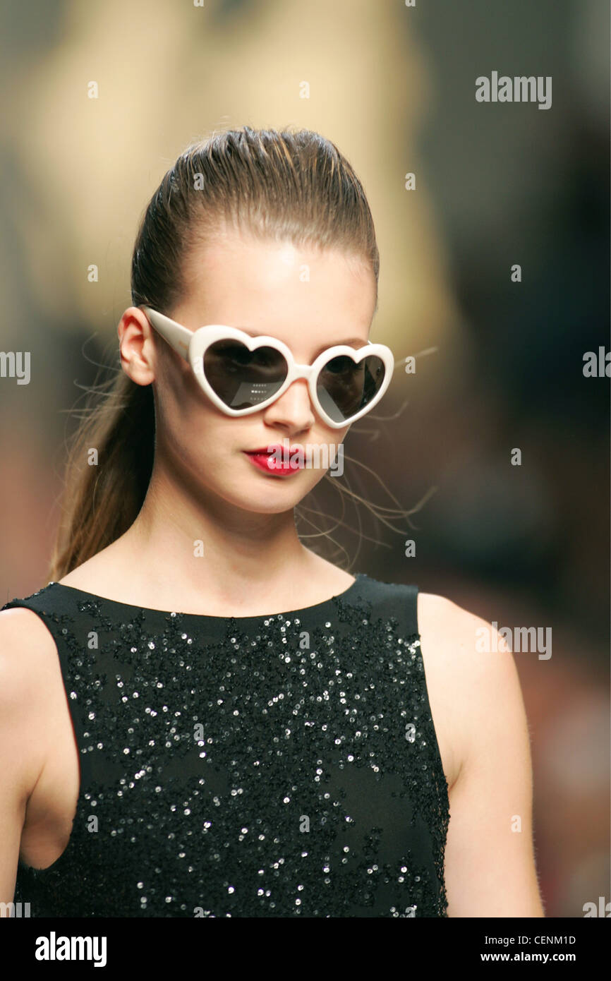Moschino Milan Ready to Wear S S Lolita look: heart shaped white sunglasses  and ponytail hair Stock Photo - Alamy