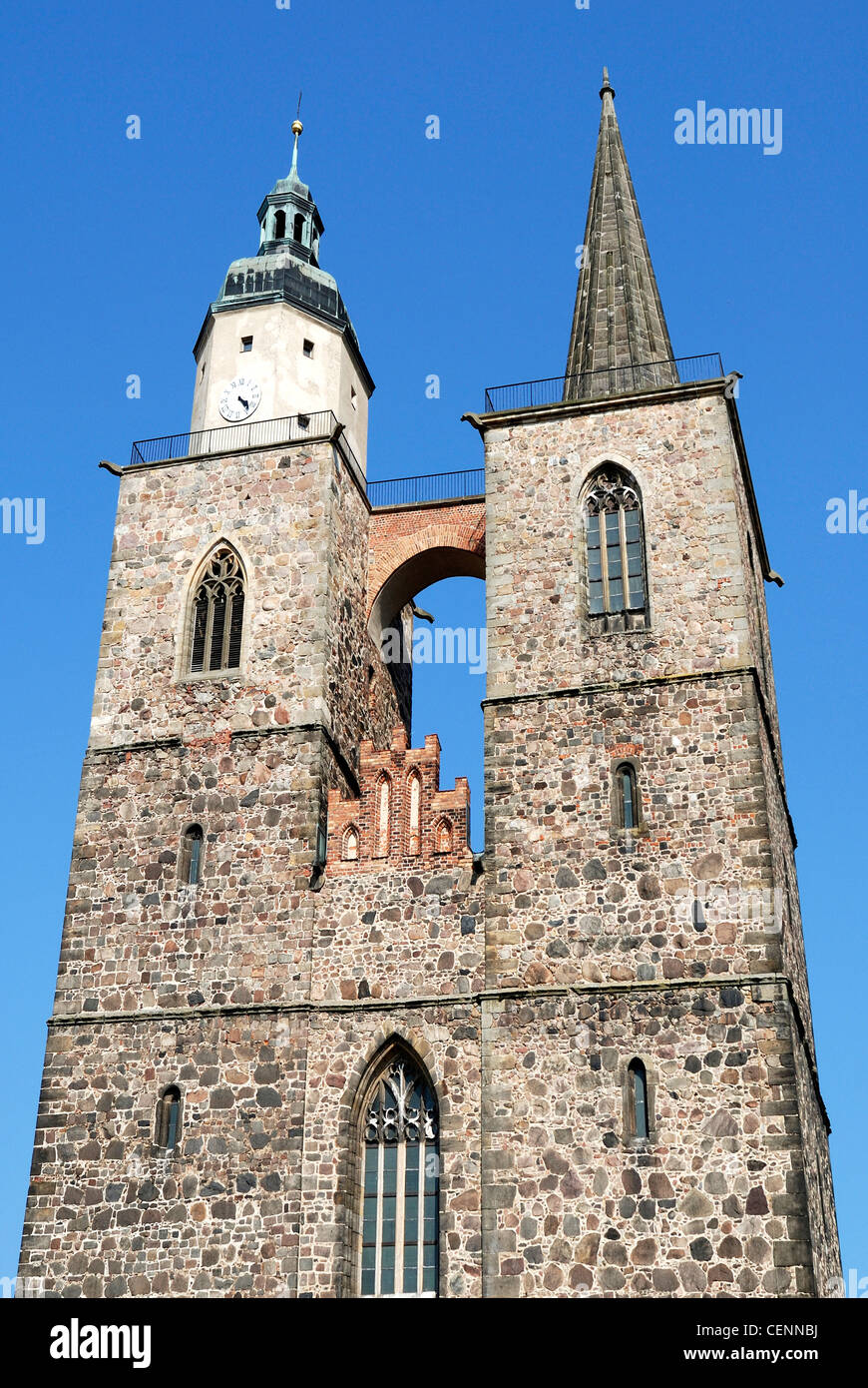 The towers of the Nikolaikirche in the historical town centre of Jueterbog. Stock Photo