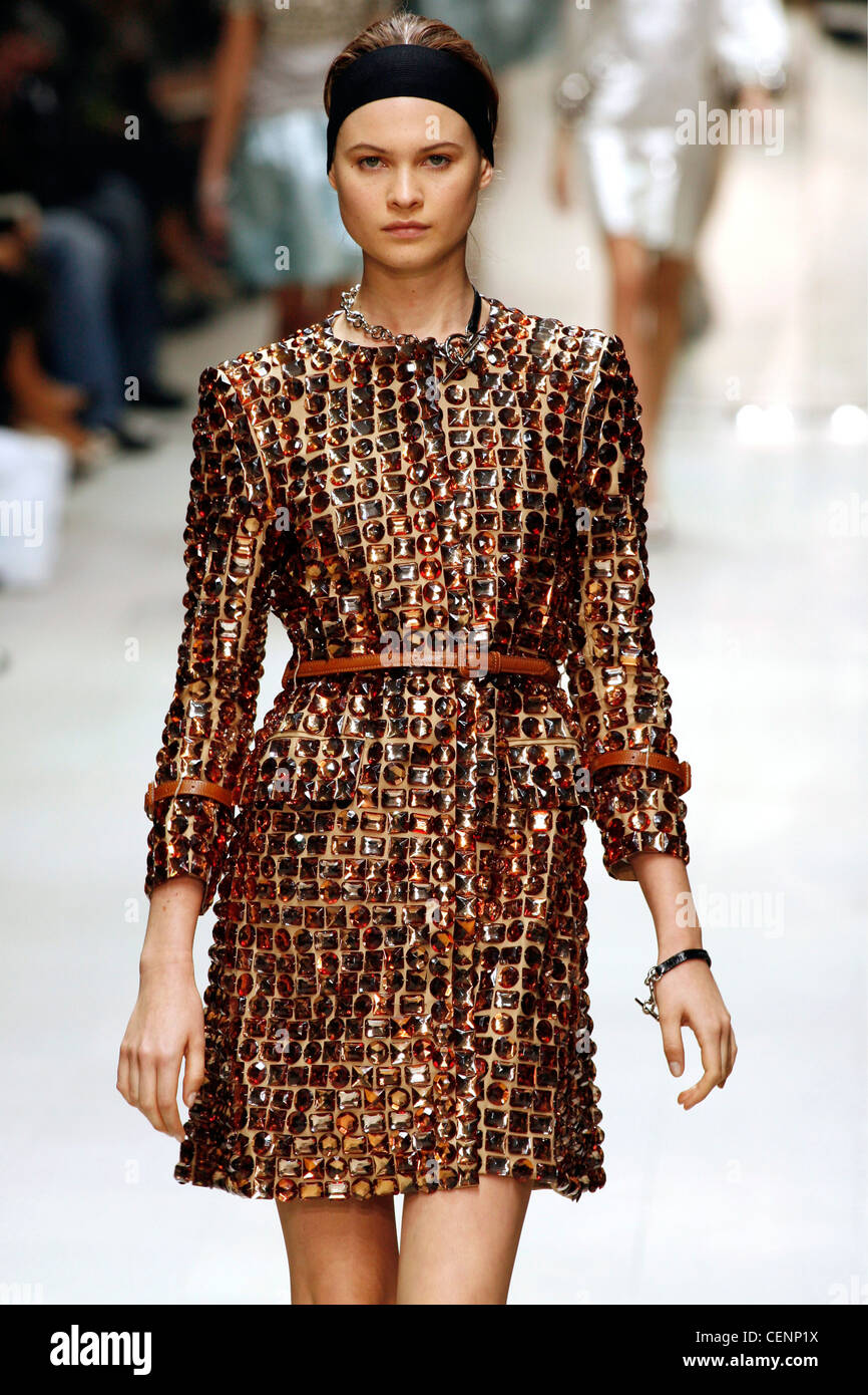 Burberry Prorsum Milan Ready to Wear Spring Summer Glass faux tortoiseshell  coat dress, look accessorized black headband and Stock Photo - Alamy