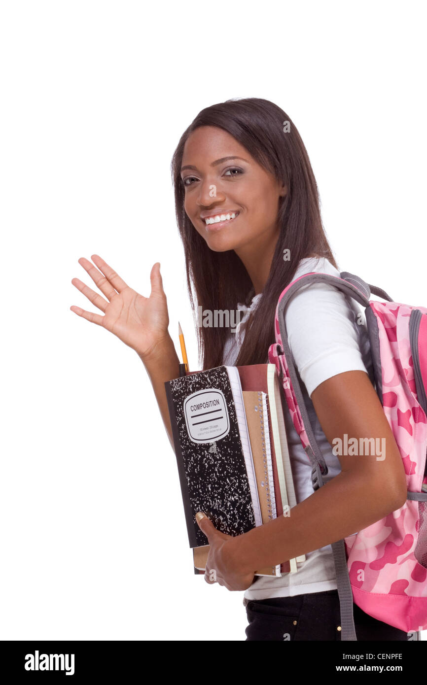 education series - Friendly ethnic black female high school student with backpack and composition book, gesturing and greeting Stock Photo