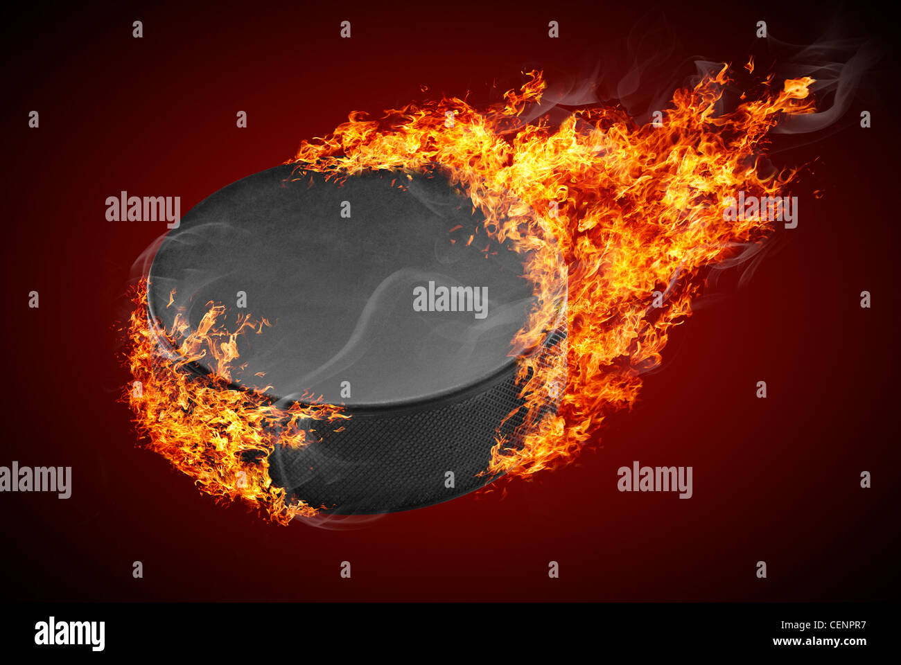Flying hockey puck on fire Stock Photo Alamy