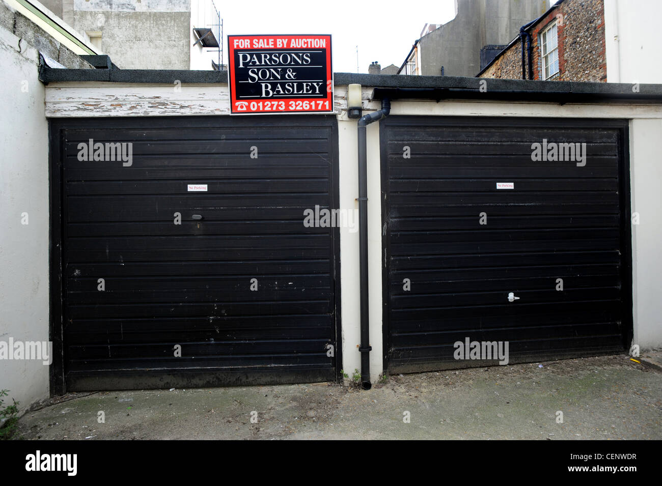 Two residential garages for sale in Brighton with an asking price of £60,000 Stock Photo