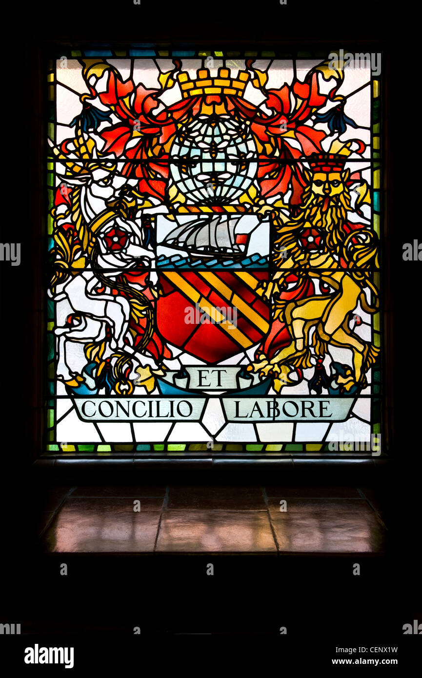 The Manchester coat of arms made in a stained glass window in the University's Sackville Street Building (Editorial use only). Stock Photo